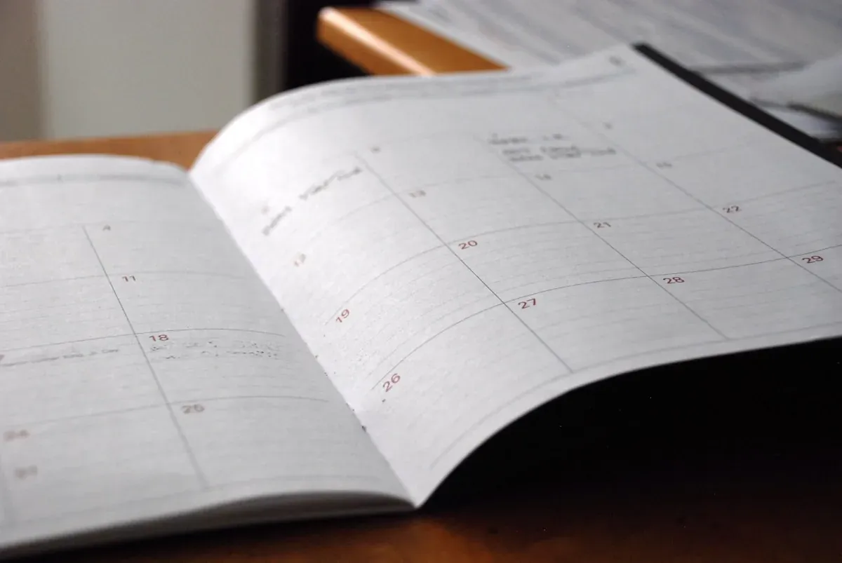 desk planner showing monthly schedule
